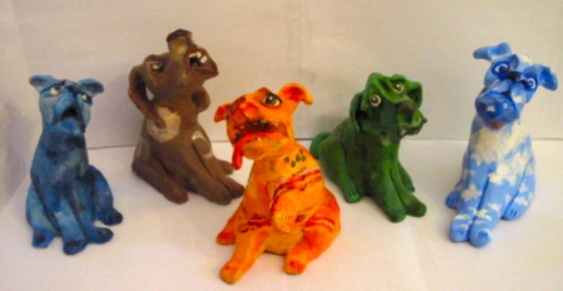 "Dogs" acrylic on clay